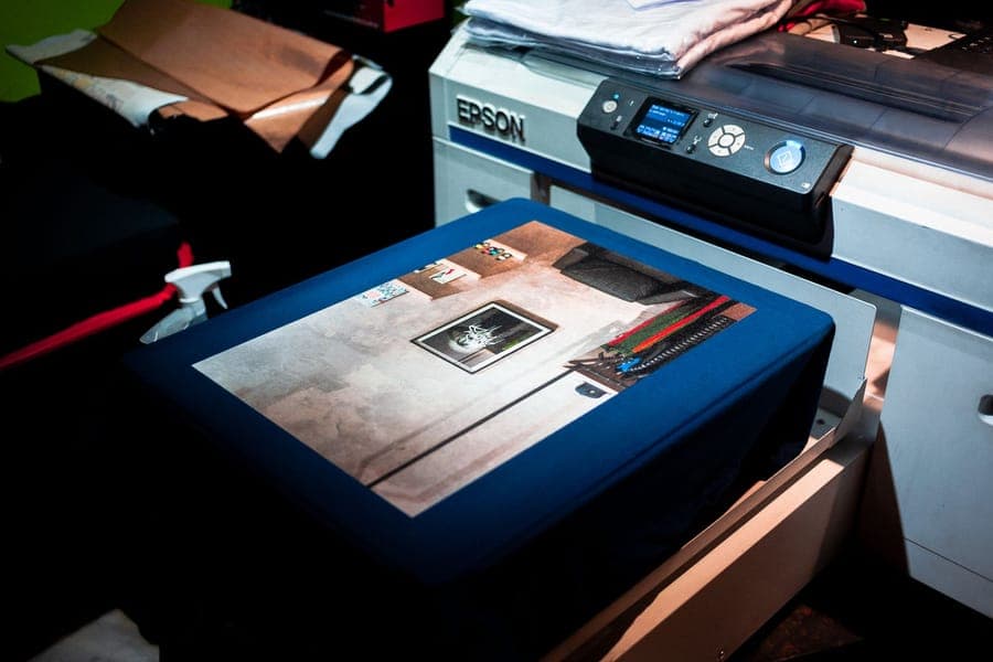 Digital printer applying artwork directly onto fabric